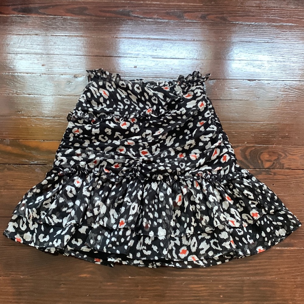 Printed, black flowy skirt. Size XS, but runs a little large.